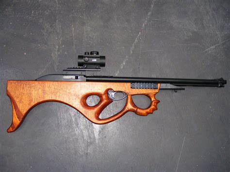 It has been used, but it is in good working condition. . Marlin model 60 magazine conversion